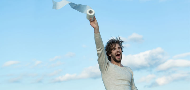 man-holding-toilet-paper