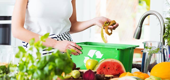 composting-woman-kitchen