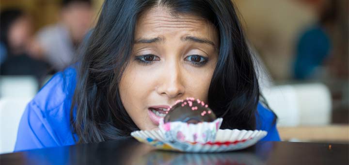 lady-staring-at-cupcake