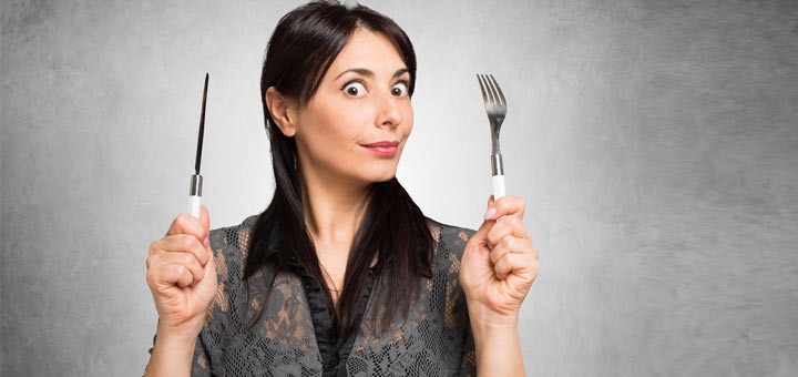 woman-holding-fork-and-knife
