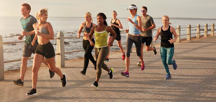 group-of-runners-near-water