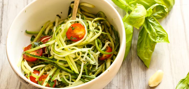 Zucchini Noodles Tossed In A Cheesy Sunflower Seed Sauce