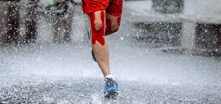 runner-in-rain-with-k-tape
