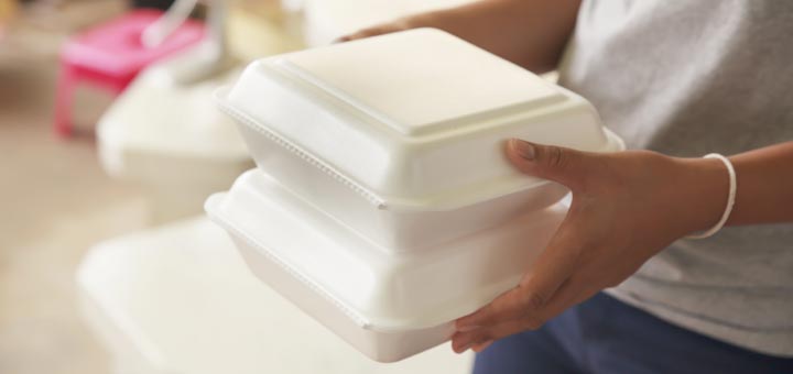 hands-holding-styrofoam-container