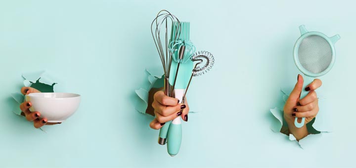 hands-holding-kitchen-tools