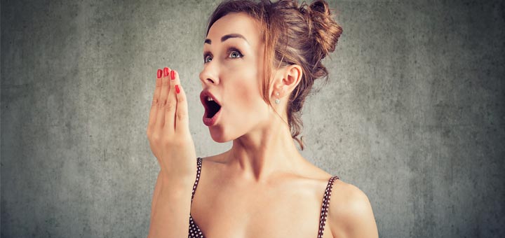 woman-smelling-breath