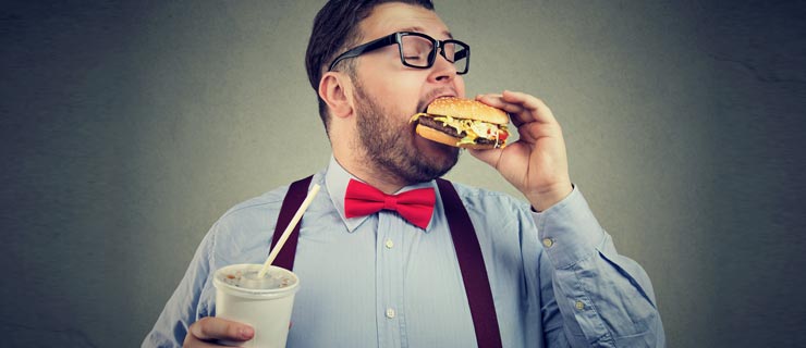 fat-man-eating-burger