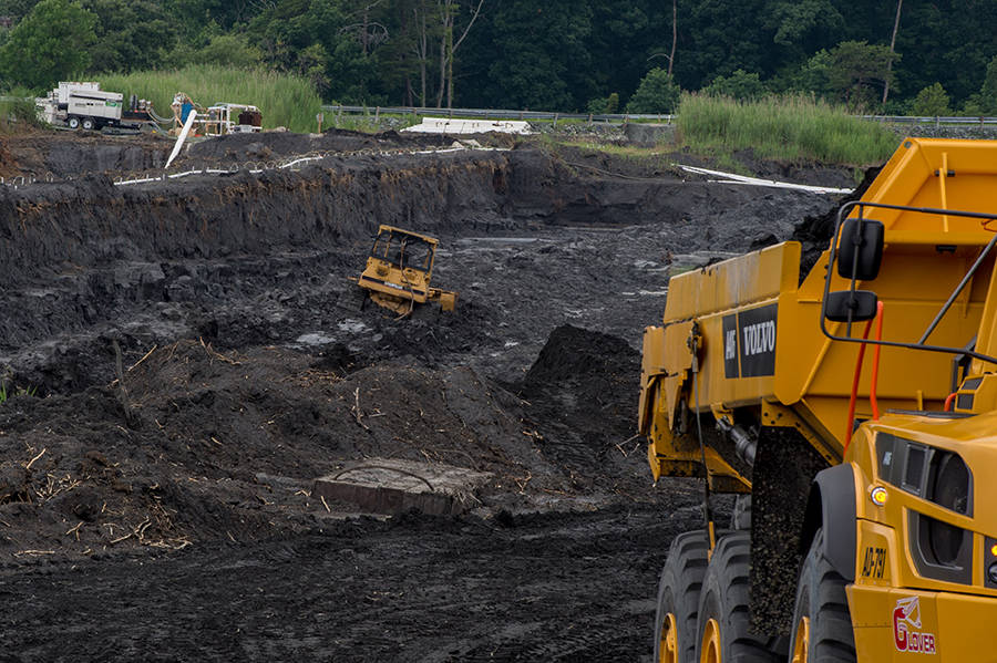 Removing coal ash from ponds at Dominion Energy's Possum Point power plant in Dumfries, Va. Credit: Kate Patterson/Washington Post via Getty Images.