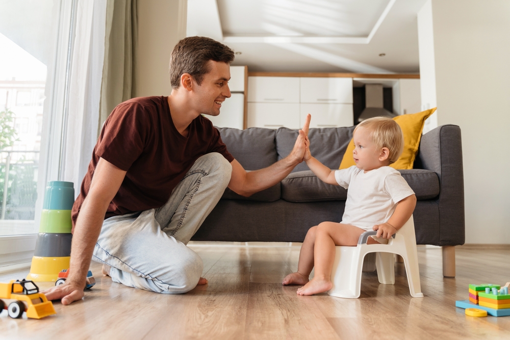 Learning Institute – Toilet Training Learning Institute - Toilet Training: A Path to Success showing a parent and child