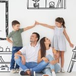 Family in a stable home filled with kids drawings