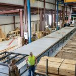 A manufactured home chassis in a construction factory