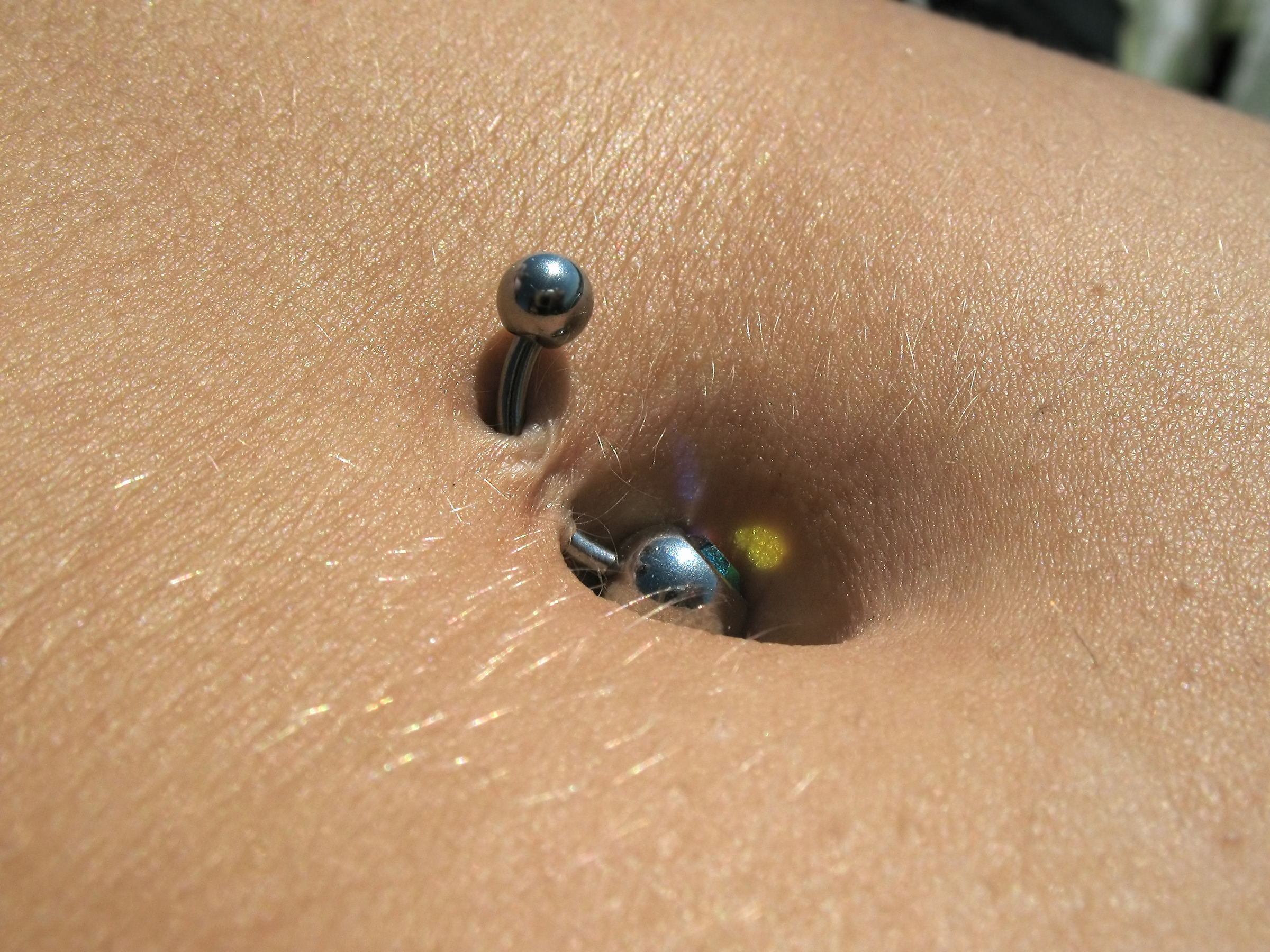 Changing belly deals button piercing