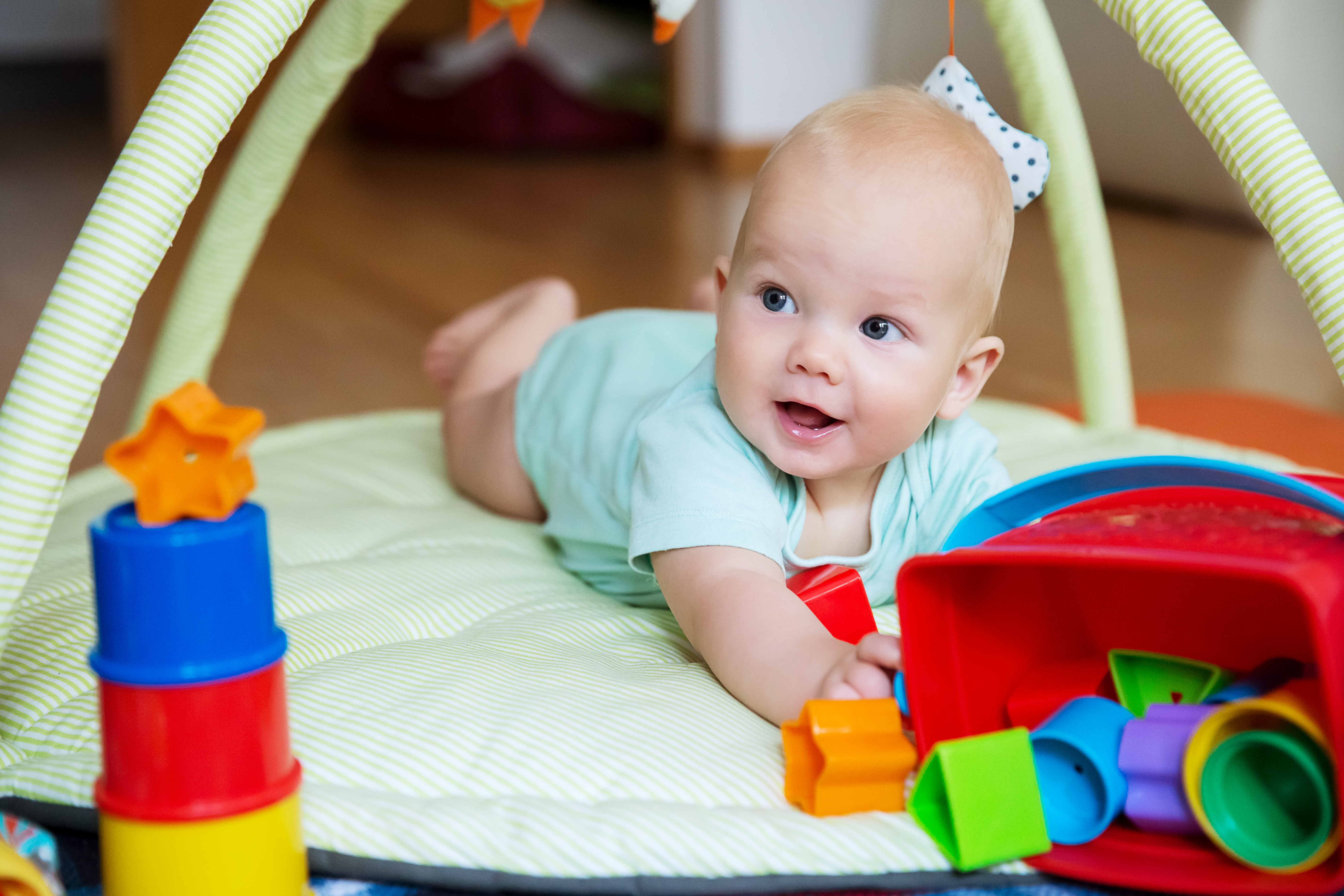 3 month old grabbing toys