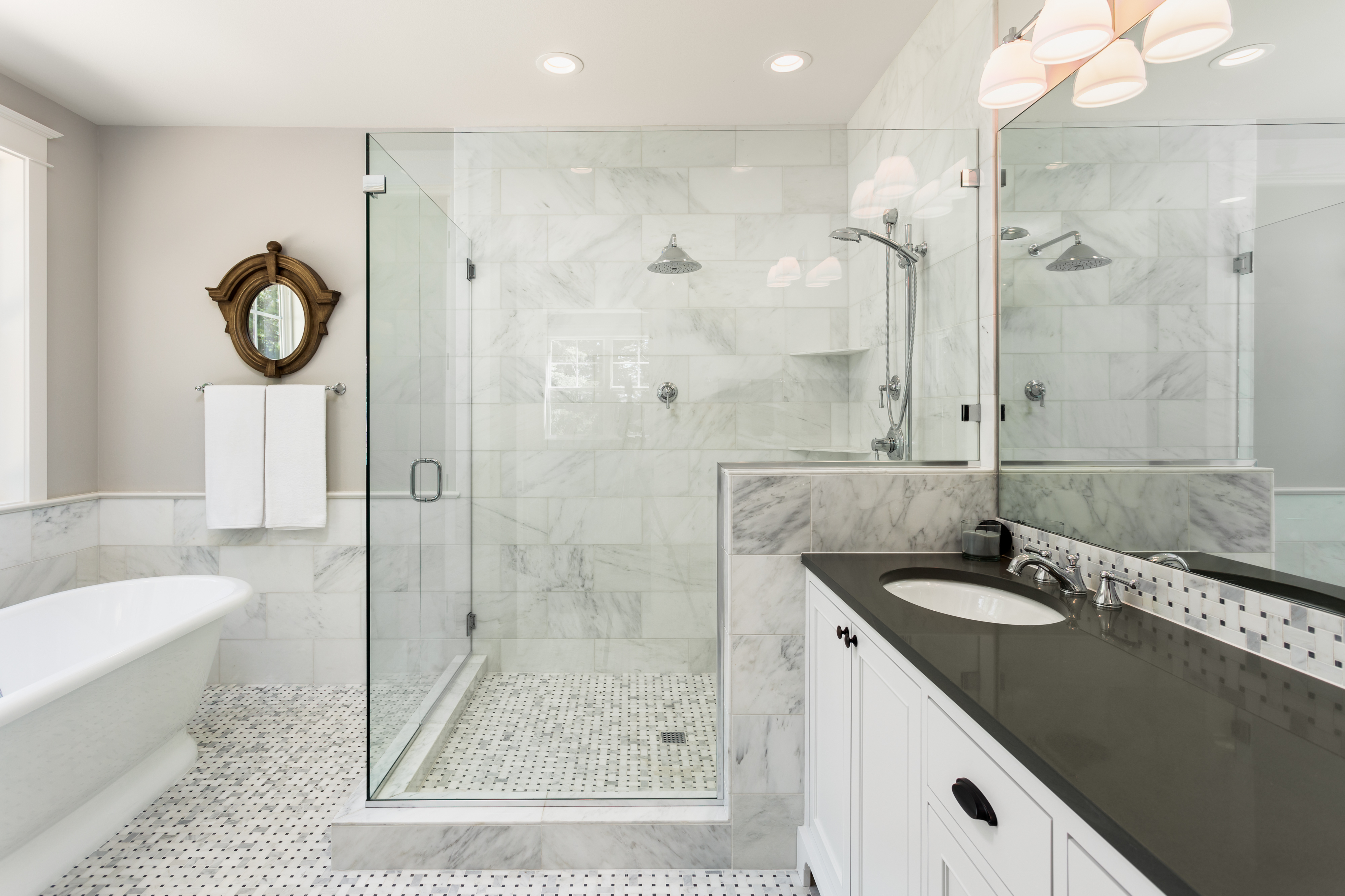 When Tiling A Bathroom Floor Does The Tile Go Under The Vanity Hunker