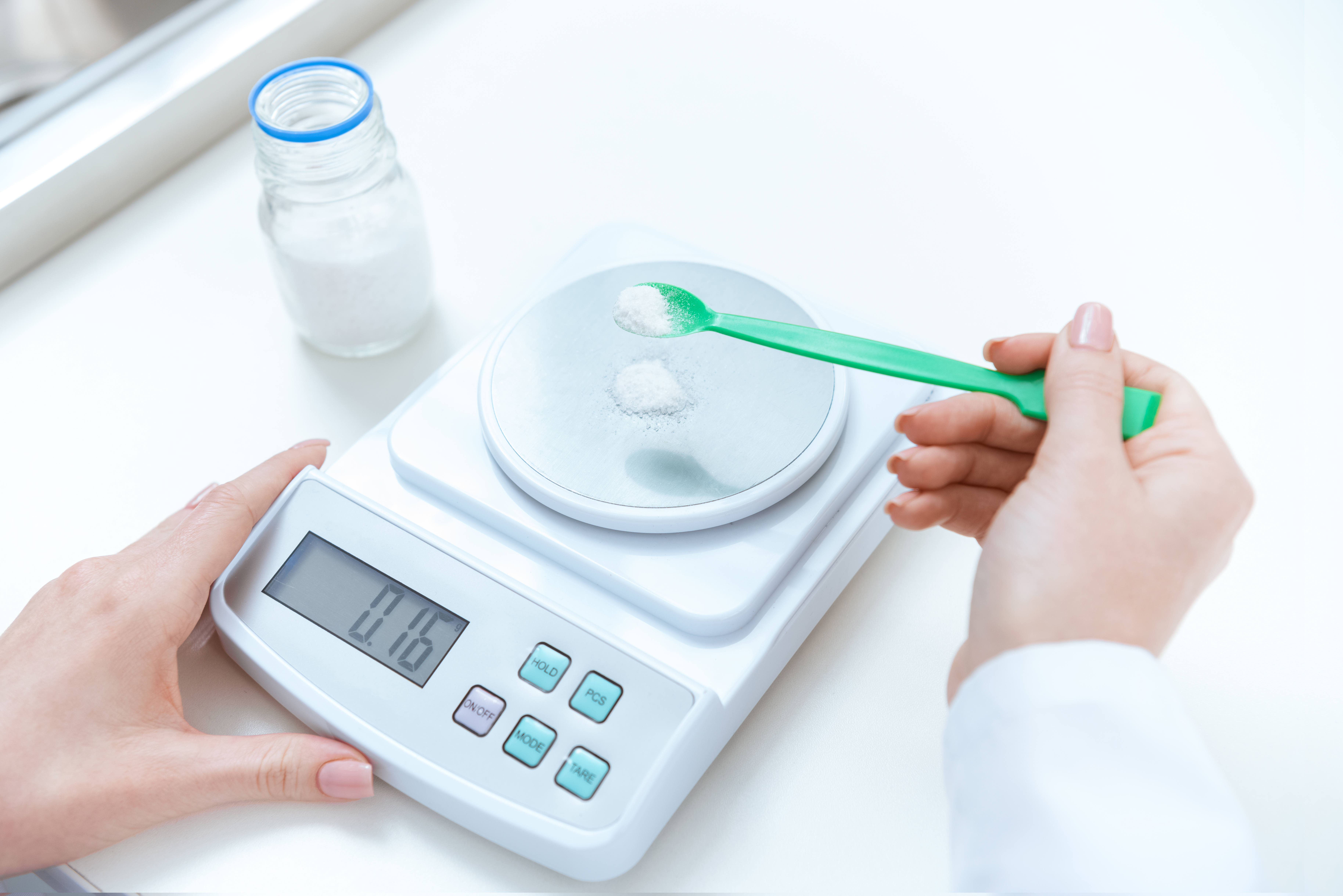 Scientist Is Weighing The Sample With Electronic Weighing Scales