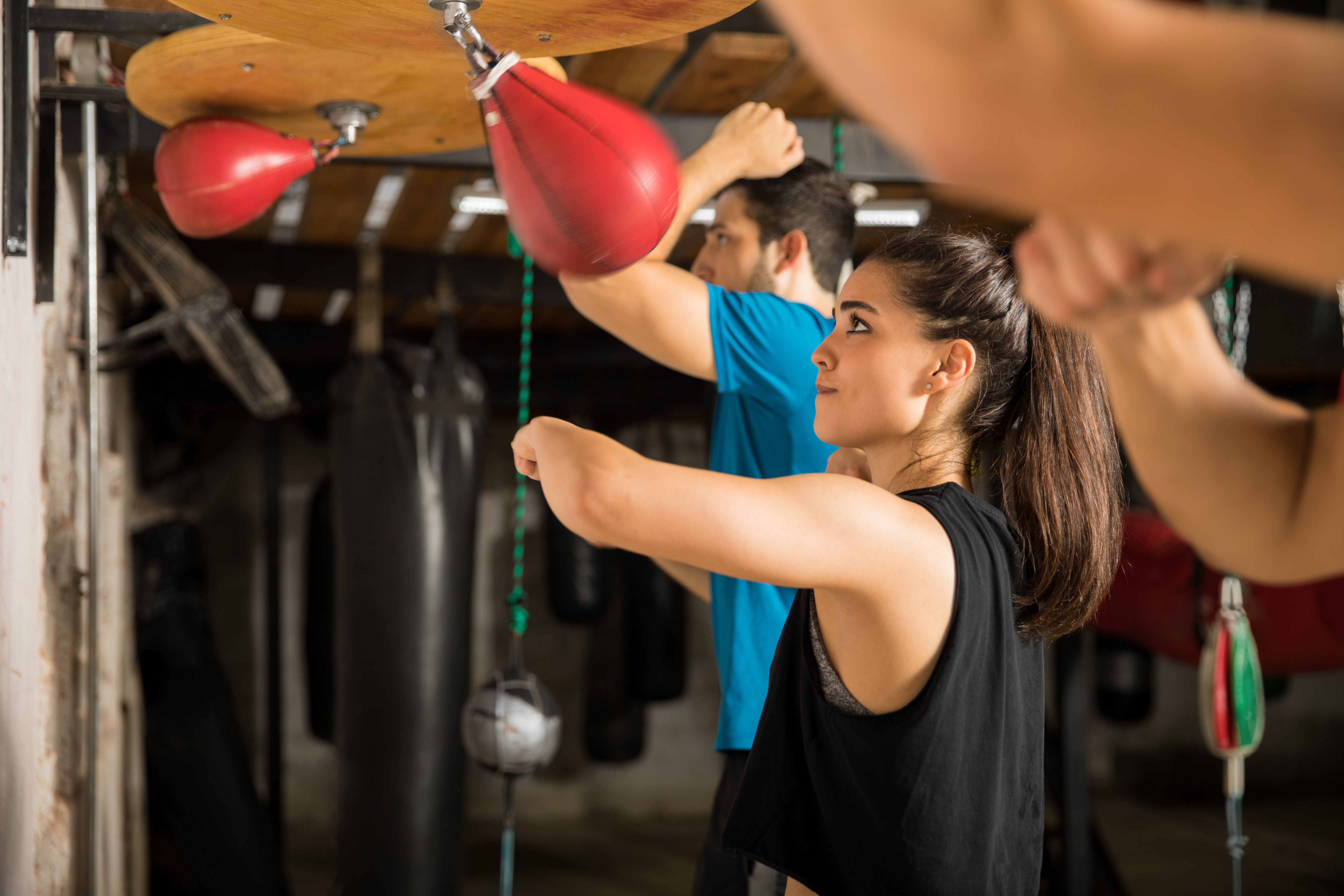 boxers hitting speed bag