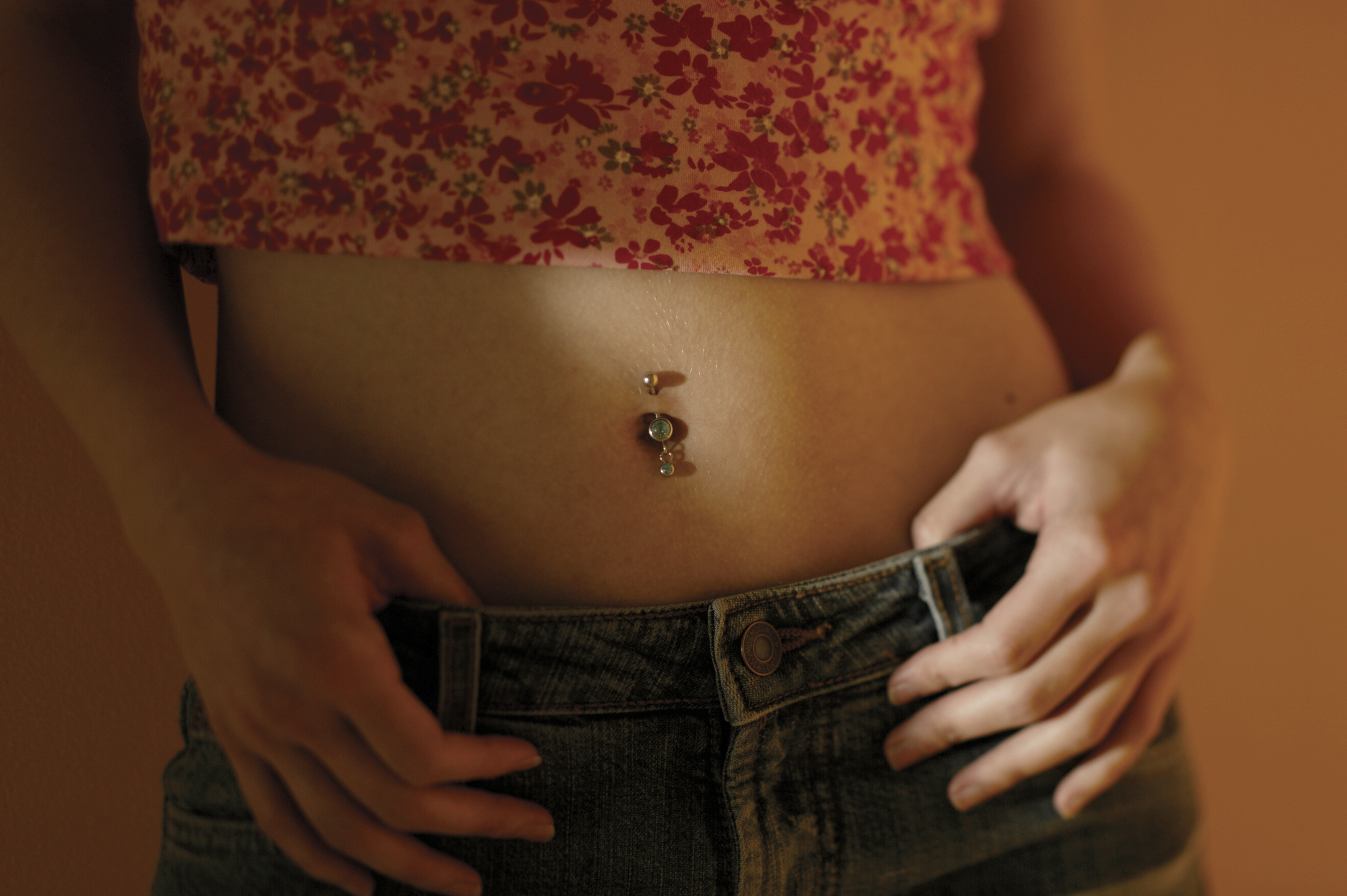 Signs belly button on sale piercing is healing