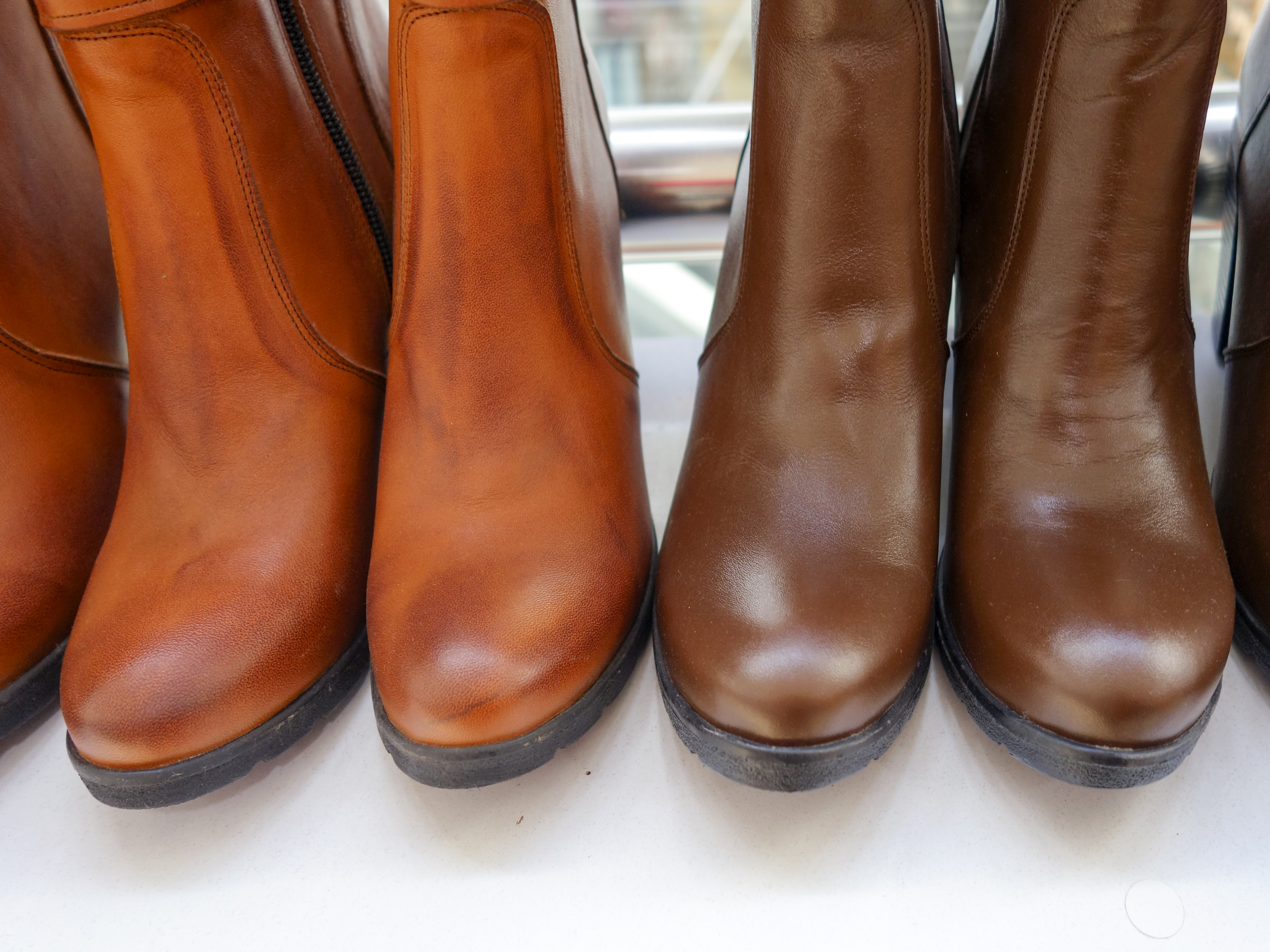 Brown boots to black boots is done easily. Just leather dye and polish is  needed.