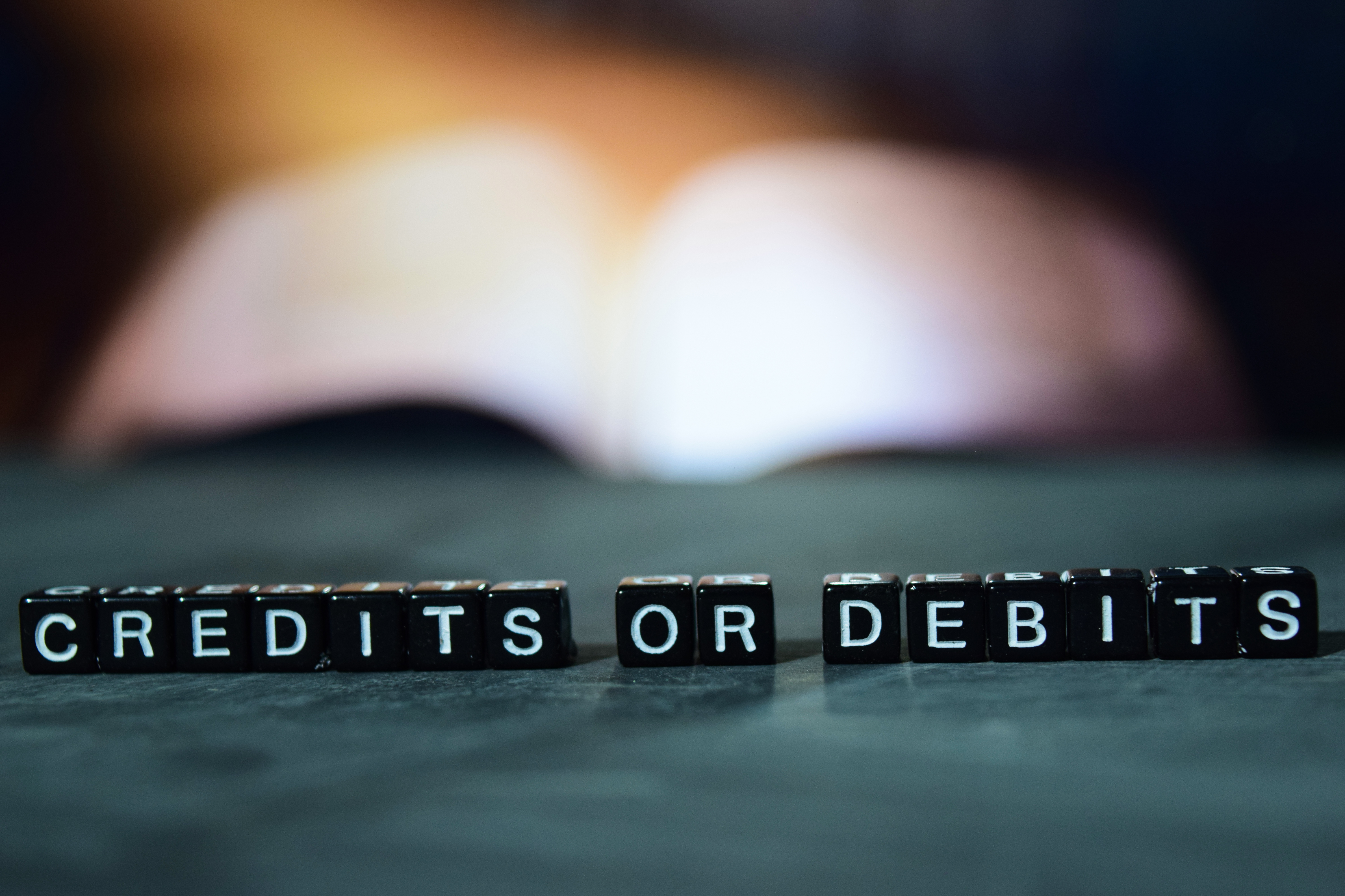 of Definition | Debit Credit Bizfluent and
