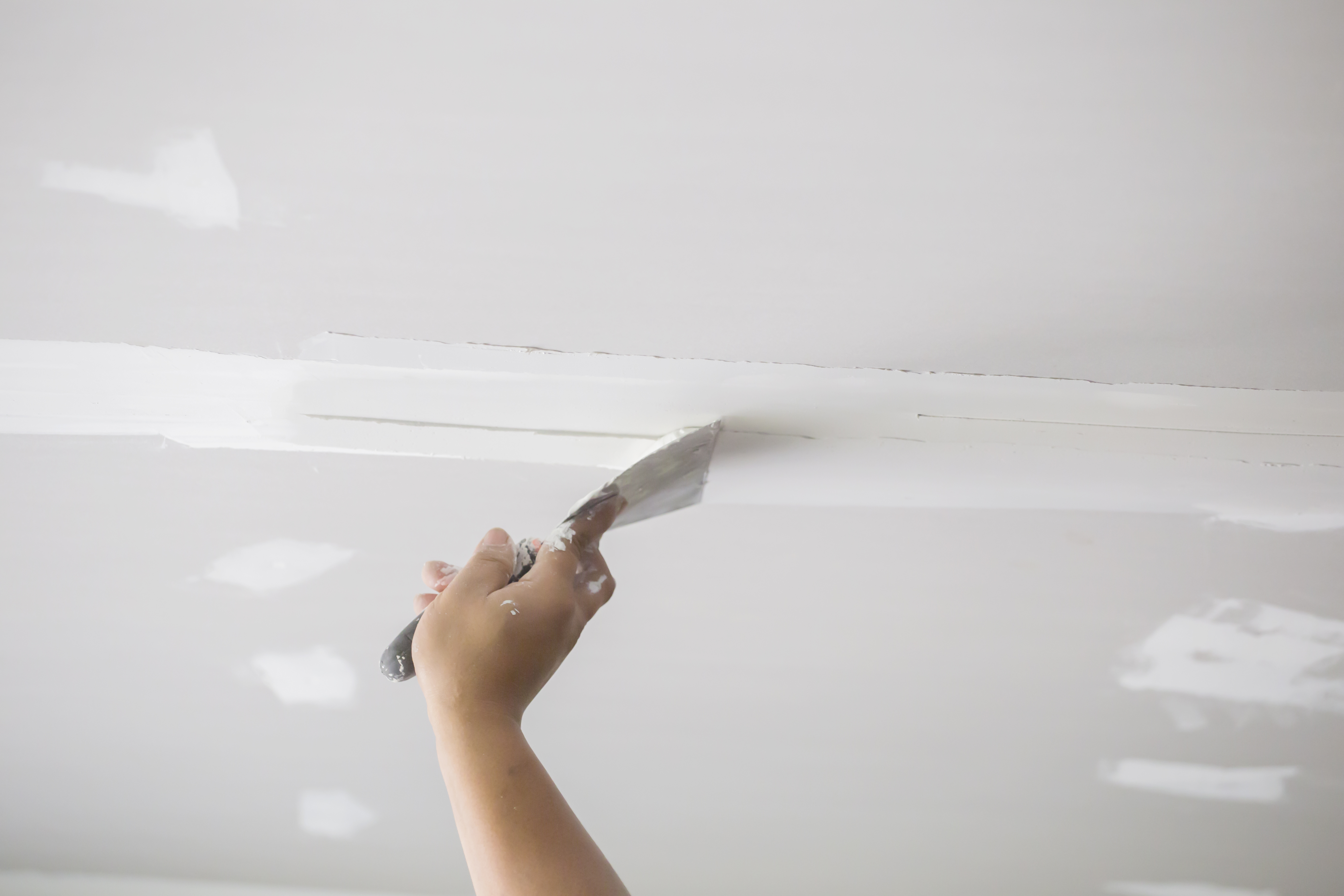 How to Fix Drywall Patch Marks Showing Through Paint