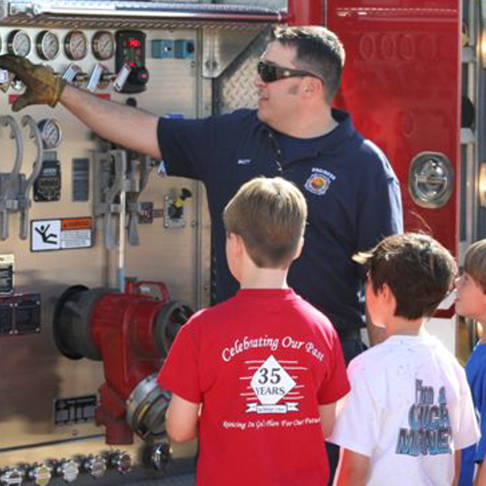 Firefighter with kids.