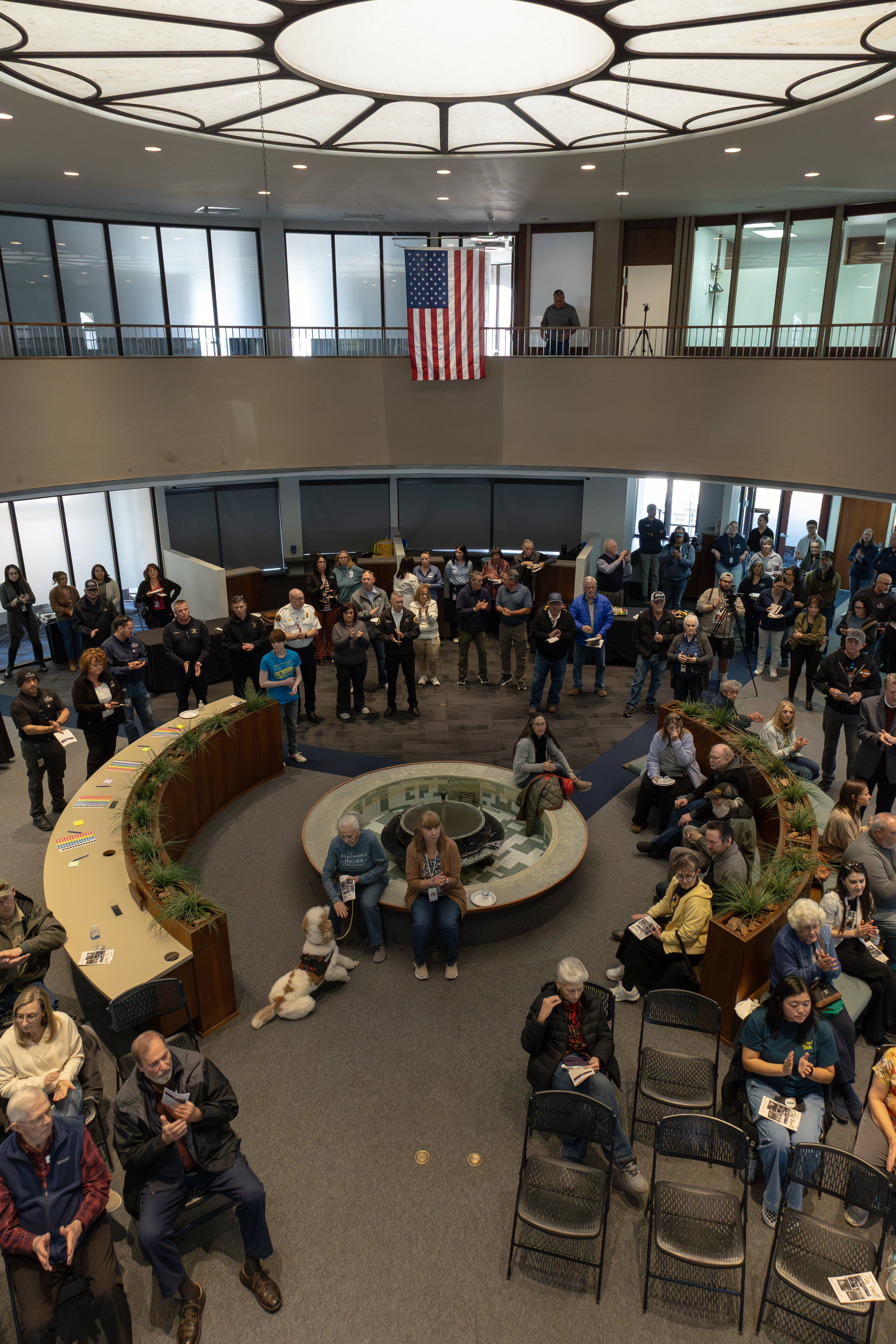 Aerial image of attendees gathered inside the building.