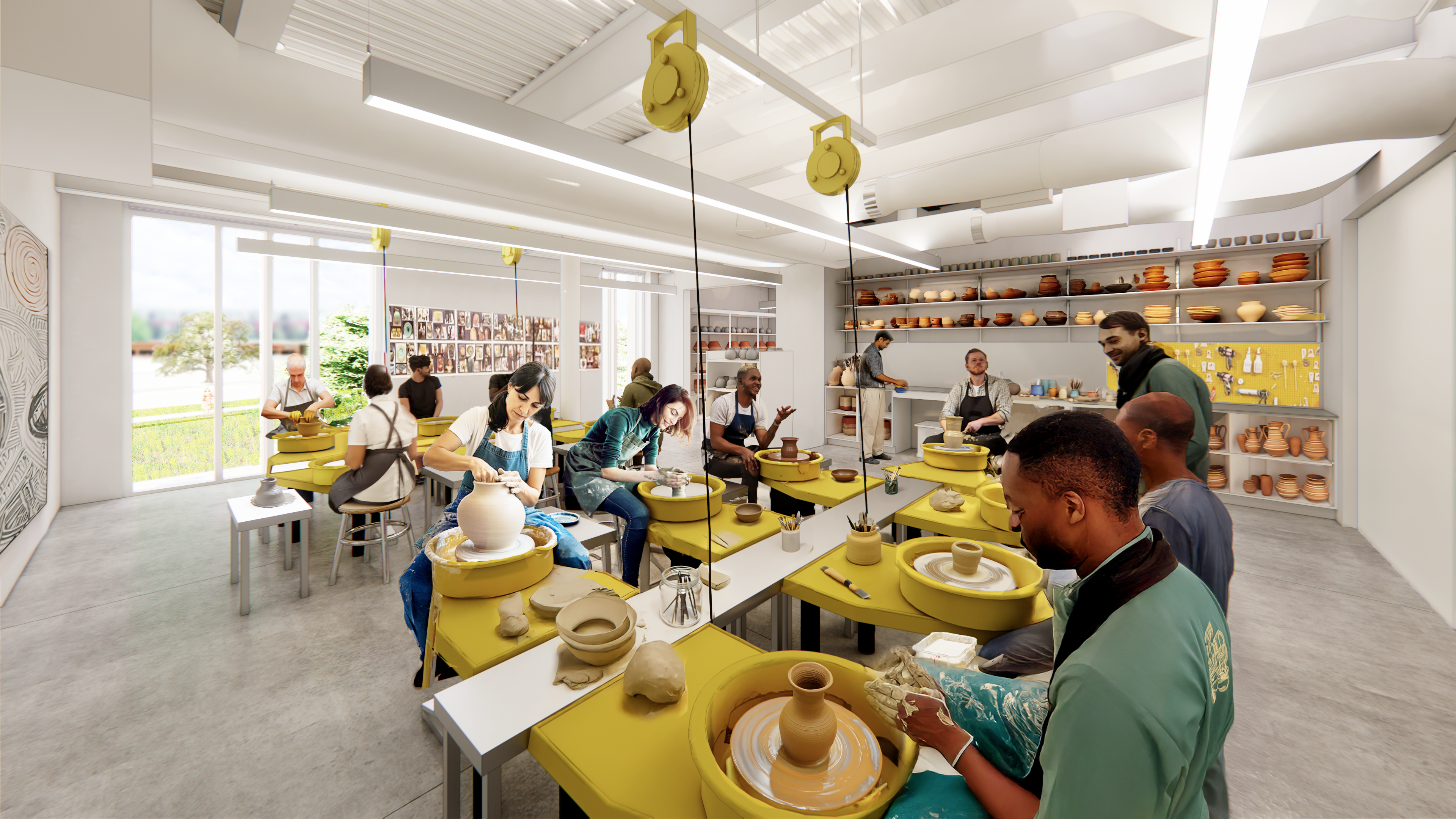 Ceremics wheel room with students throwing pots with clay.