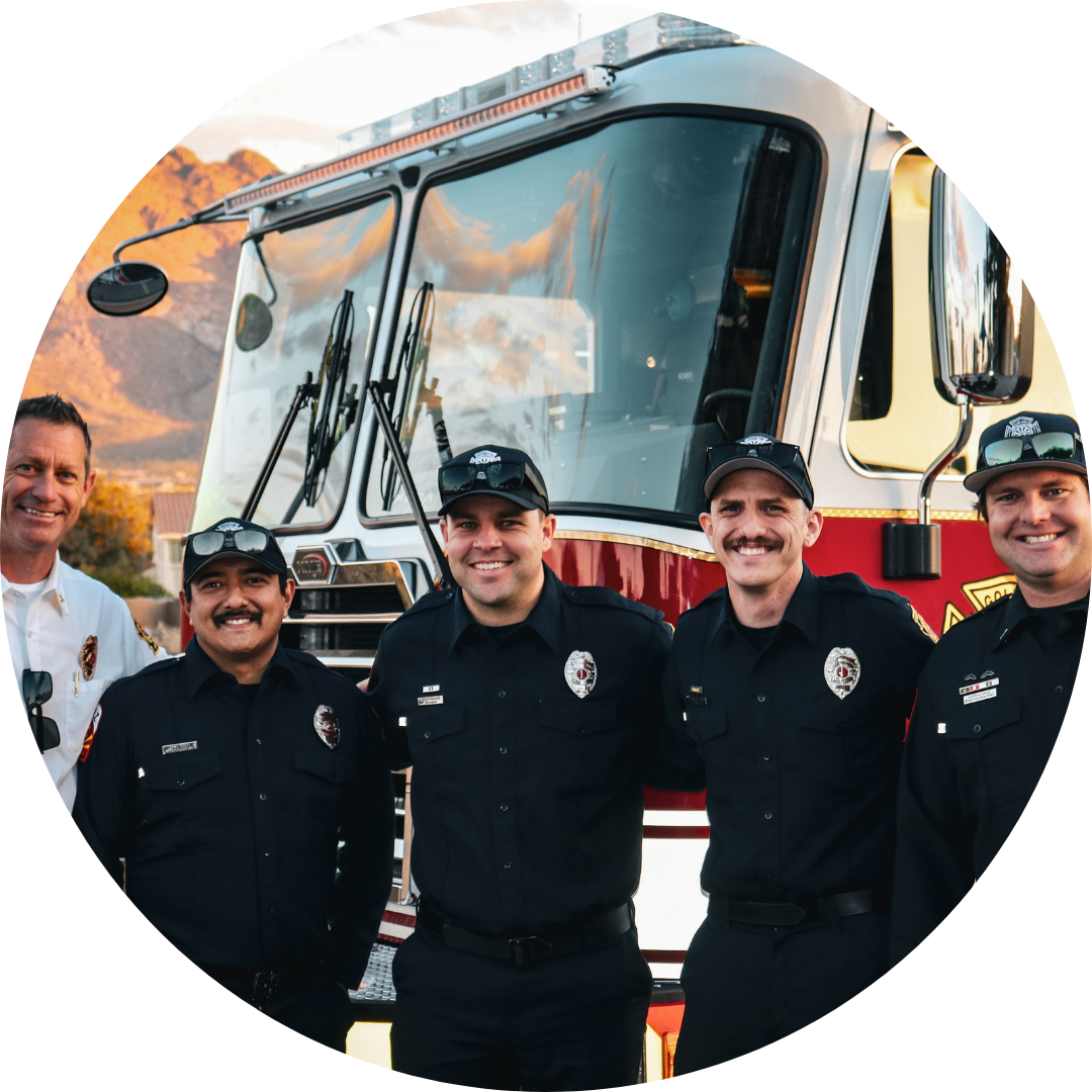 firefighters in front of fire truck