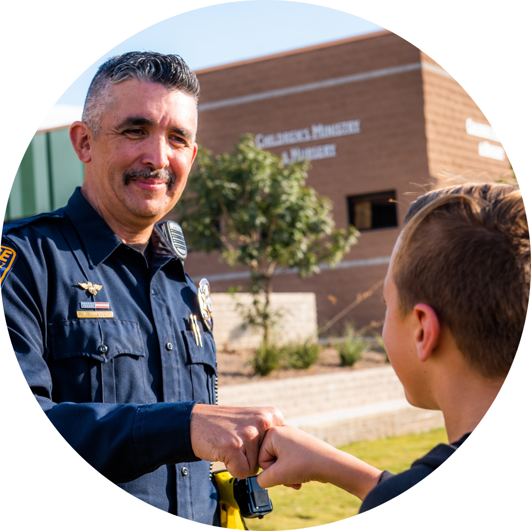 police greeting a child