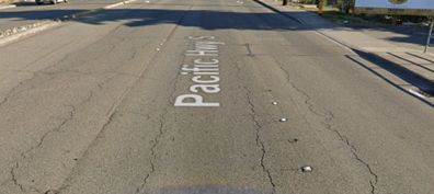 An image showing a section of SR 99 with worn pavement.