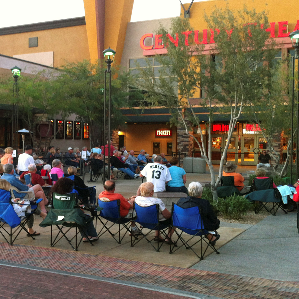 People listening to music at the Oro Valley Marketplace.
