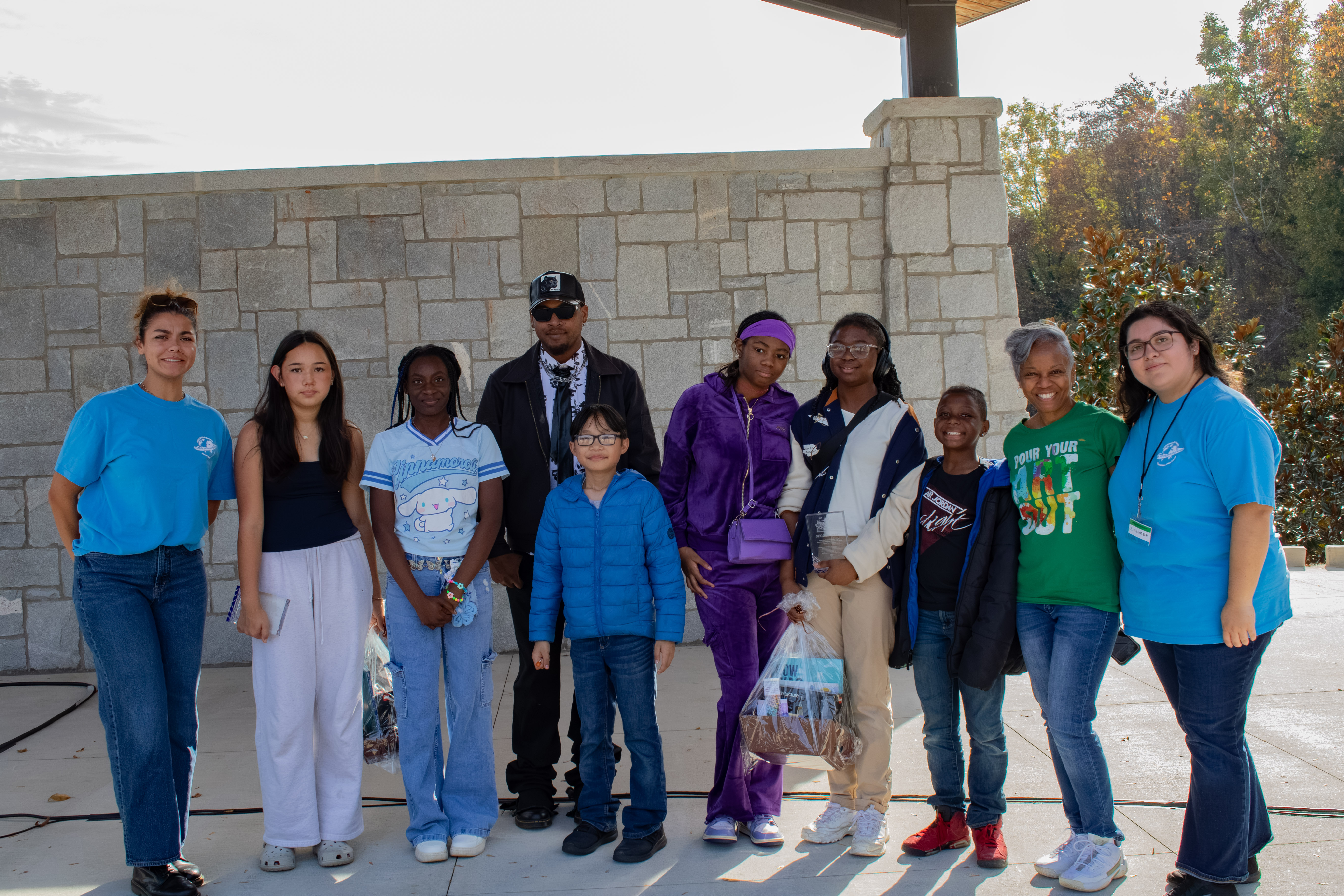 Group of DeKalb County Planning and Board of Education staff, and top winners of the World Planning Day Middle School Art Contest