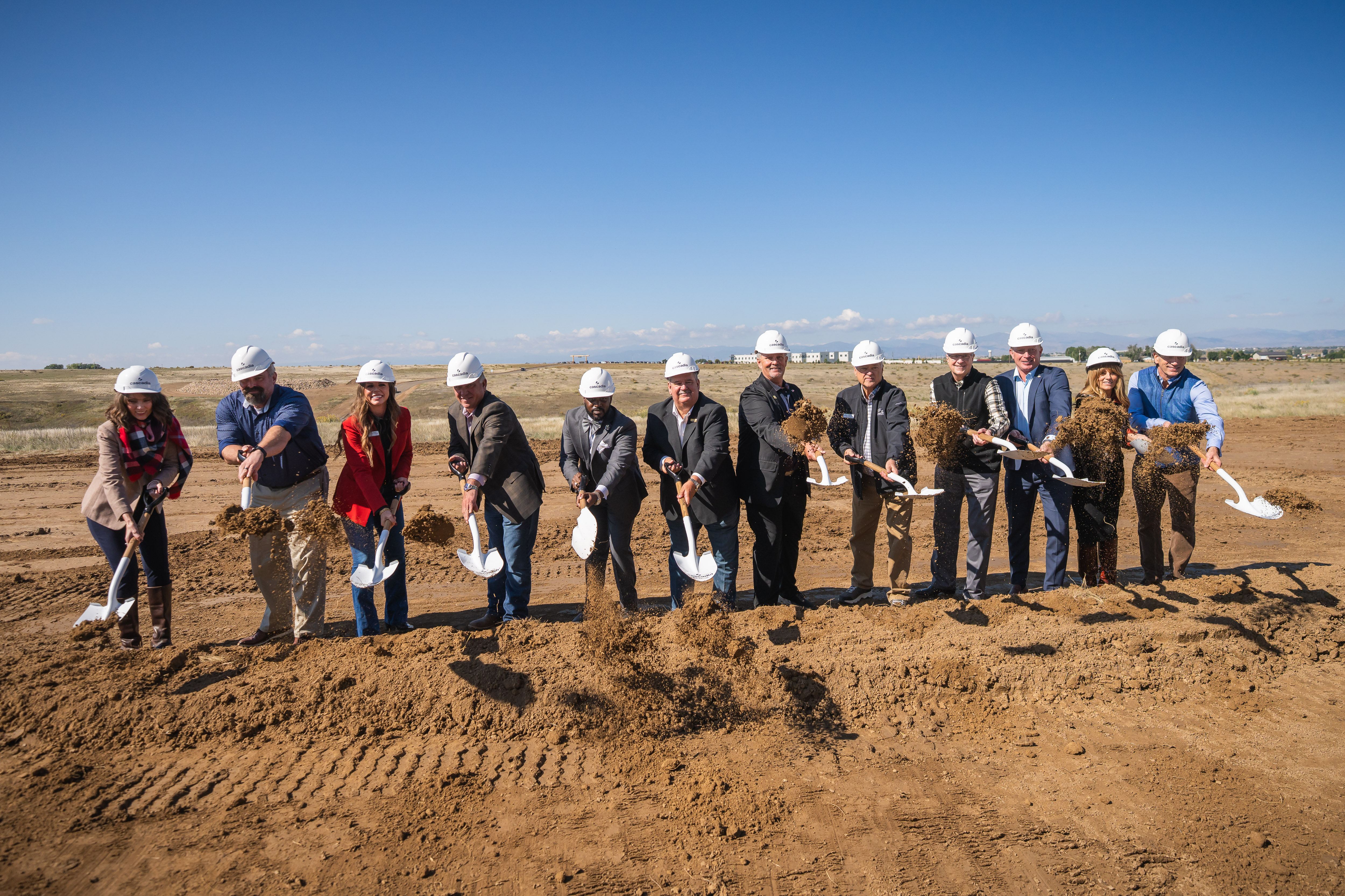 City of Greeley leaders and partners at the West Greeley Catalyst Groundbreaking, Sept. 24, 2025. Left to right: Blair Snow, Councilmember Brett Paton, Councilmember Melissa McDonald, Councilmember Johnny Olson, City Manager Raymond Lee, Mayor John Gates, Martin Lind (Water Valley), Mayor Pro Tem Dale Hall, Gary Kerr (Water Valley), Ryan Bach (Colorado Eagles), Ashley Stiles (Tribe Development), and Paul Trumbino.
