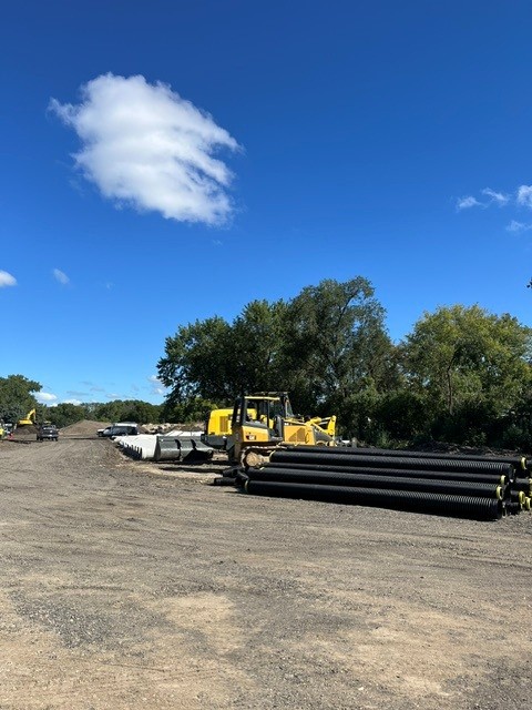 Utility pipes and construction Equipment at Fred Richards Park