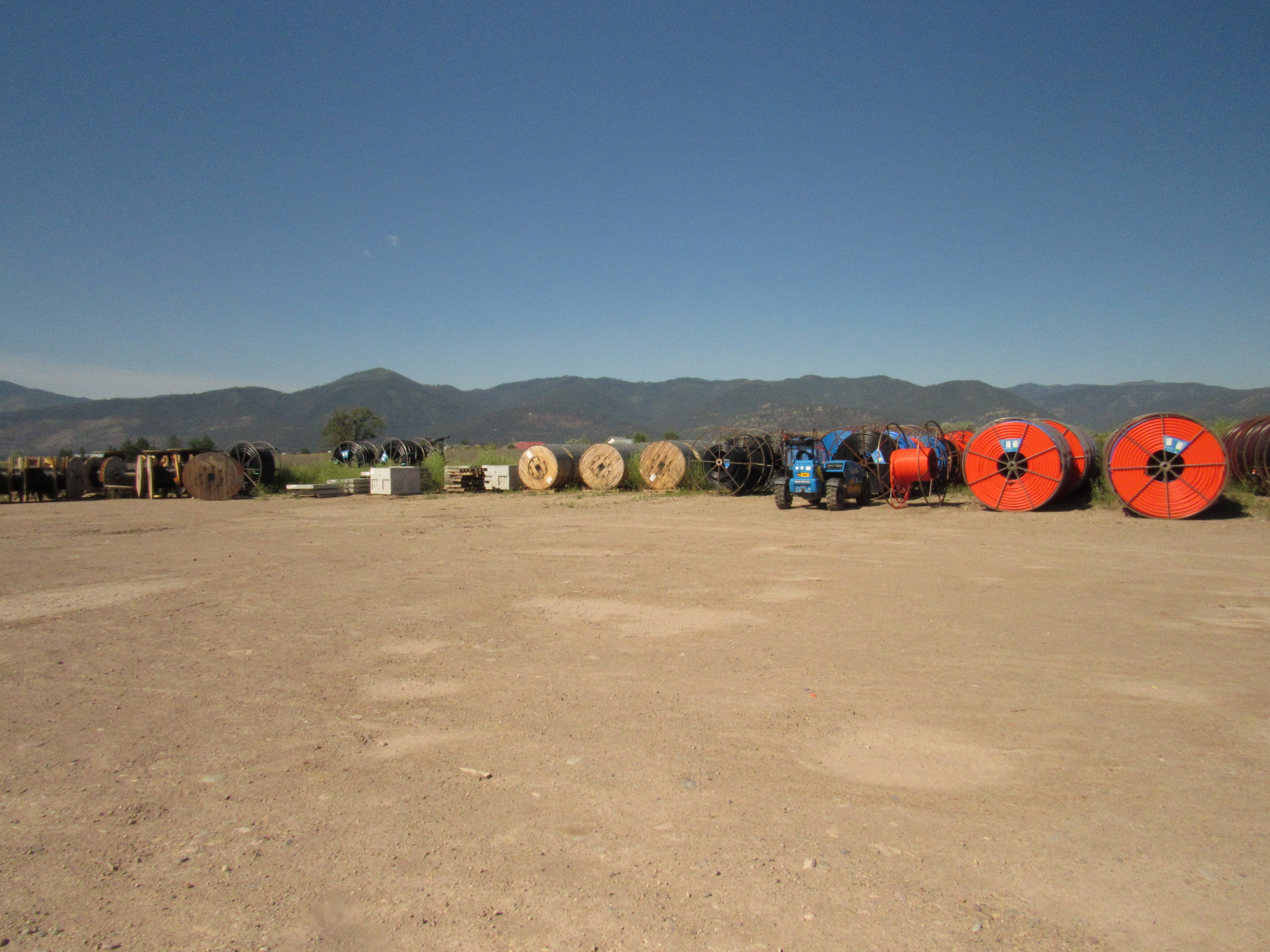 Heavy machinery and equipment being stored at the proposed development site. 