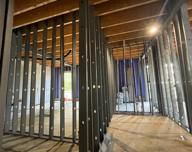 This image shows interior wall framing for spaces like staff work and break rooms, wellness room, restrooms, and mechanical rooms.