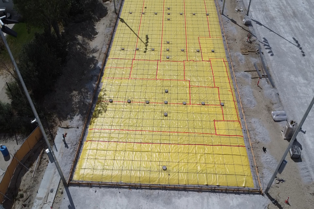 Drone flies over new pickleball court construction area