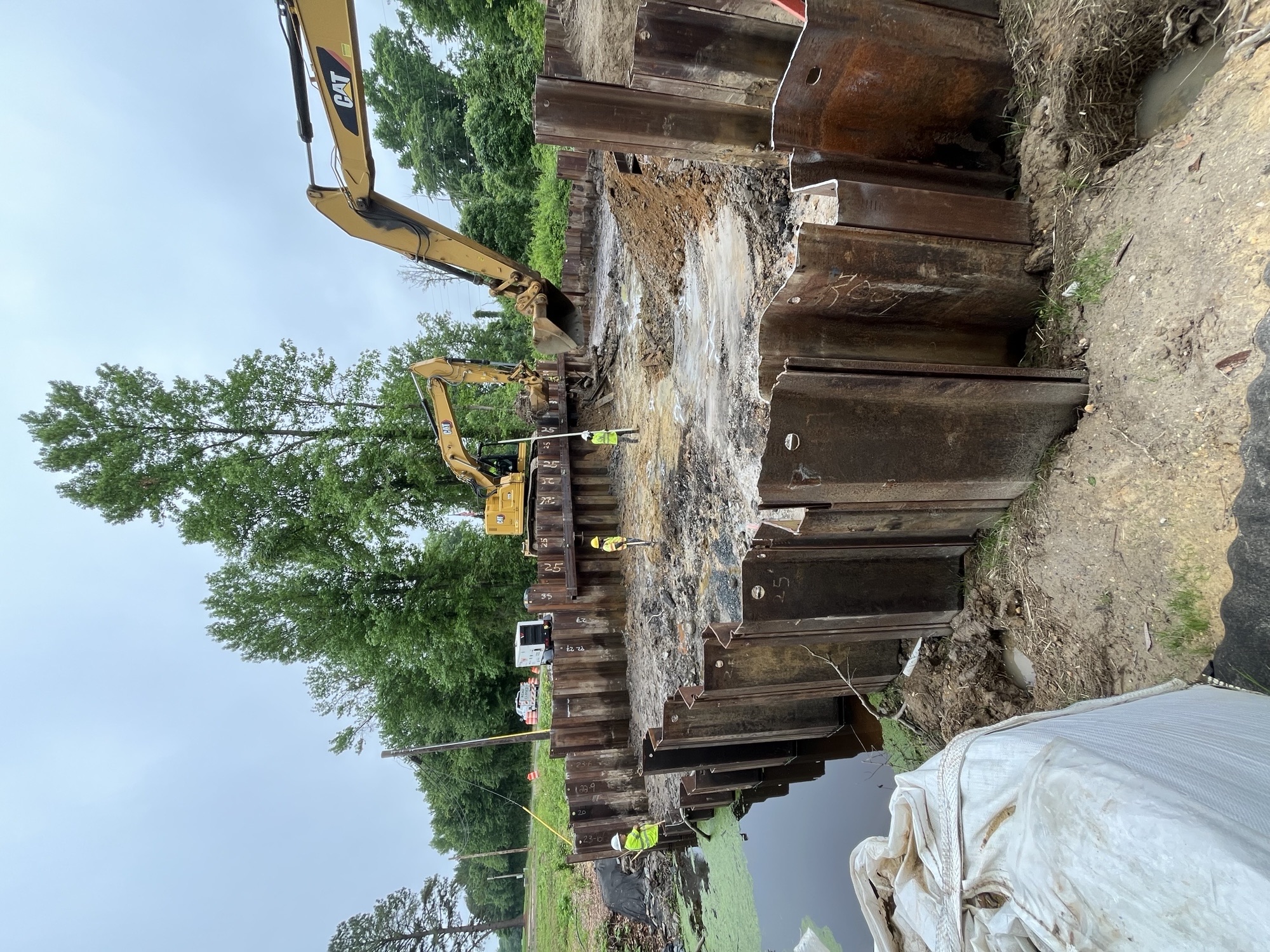 Sheet pile cofferdam installed around the culvert location