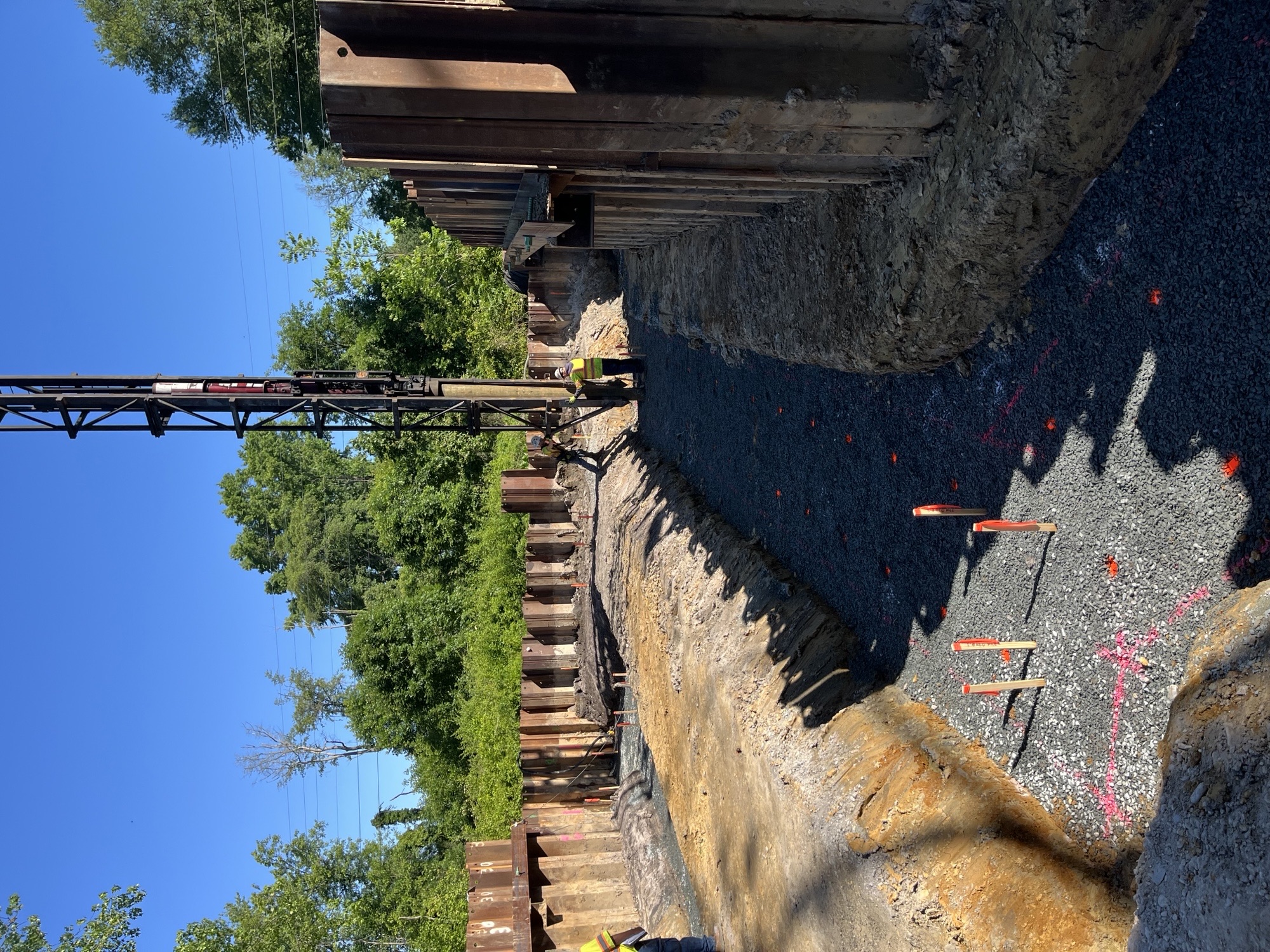 Footing excavation and timber pile alignment