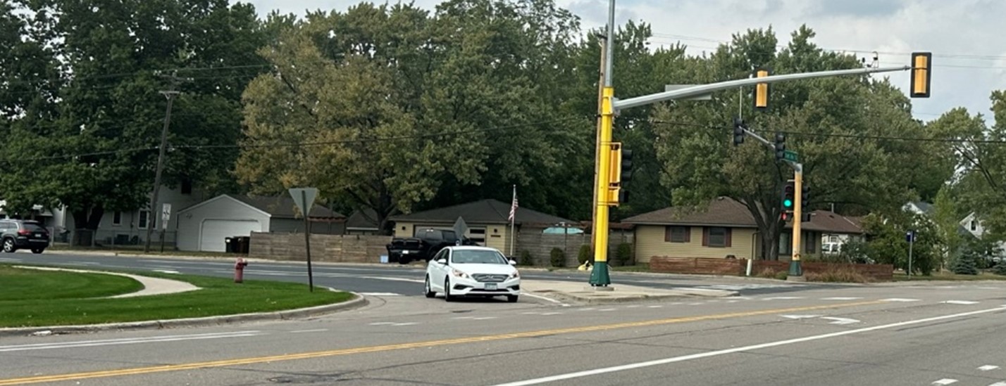A car making a right turn at an intersection