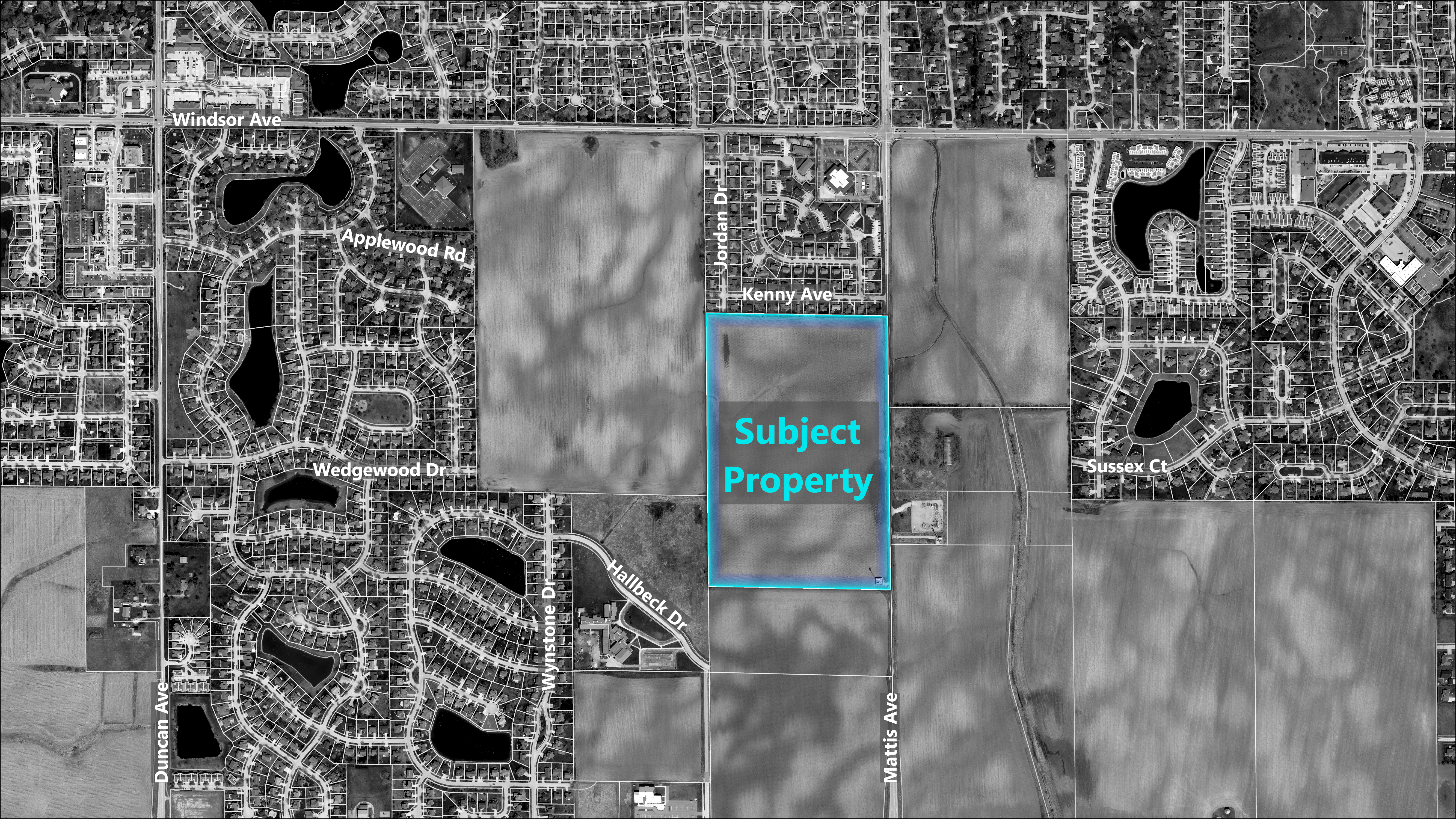 A black and white aerial map highlighting the subject property in blue. The subject property is on the west side of Mattis Ave, south of Windsor Ave and immediately south of Kenny Ave.