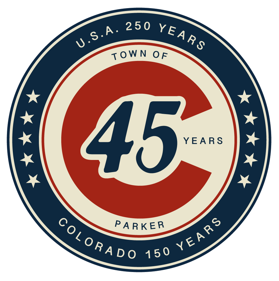 The circular logo is navy, red, and tan. The outer navy ring features "USA 250 Years" and "Colorado 150 Years." The central tan circle features a large red letter C with navy lettering reading "Town of Parker 45 years."