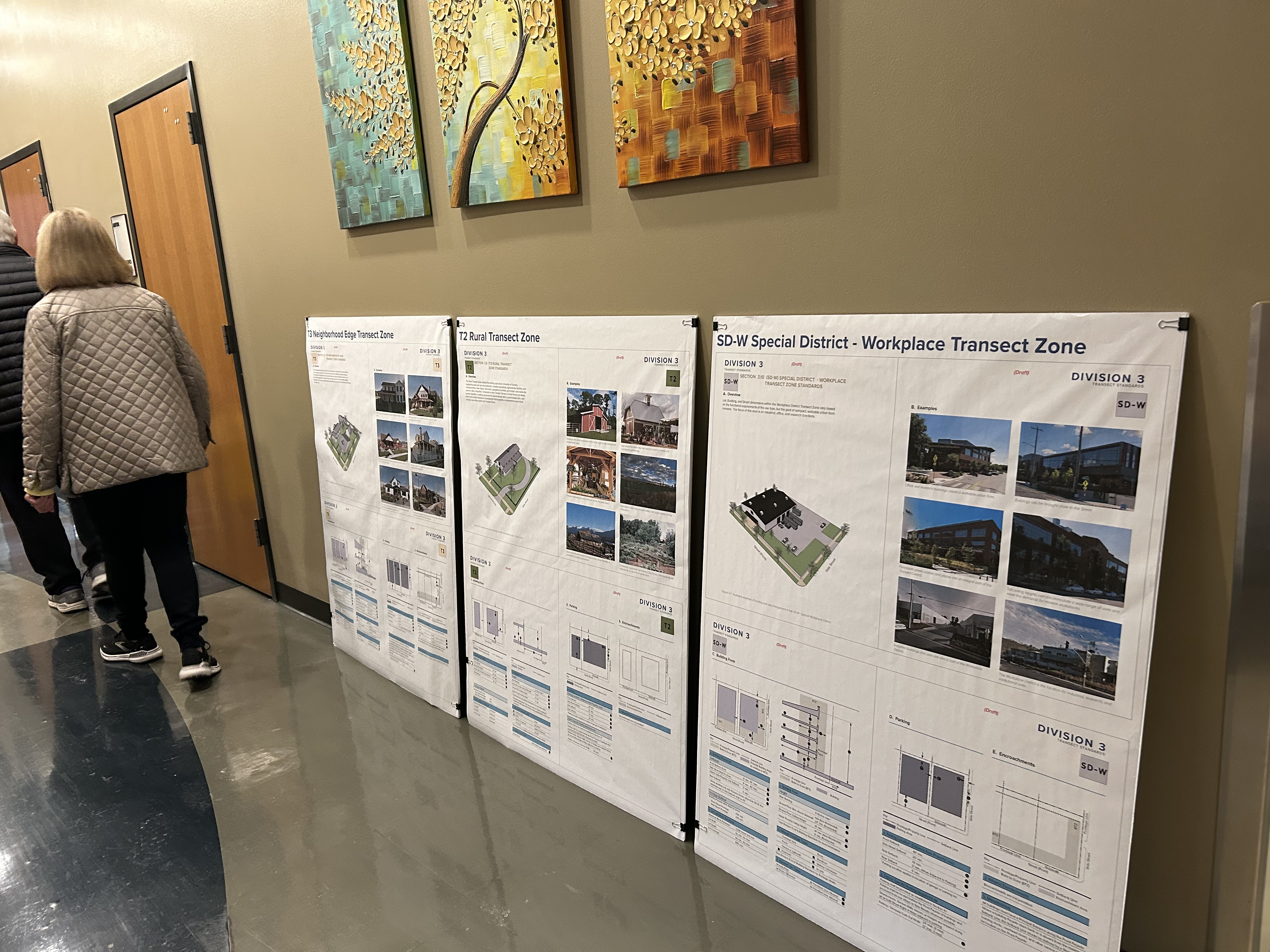 Draft planning boards are displayed during the Westside Area Plan open house.