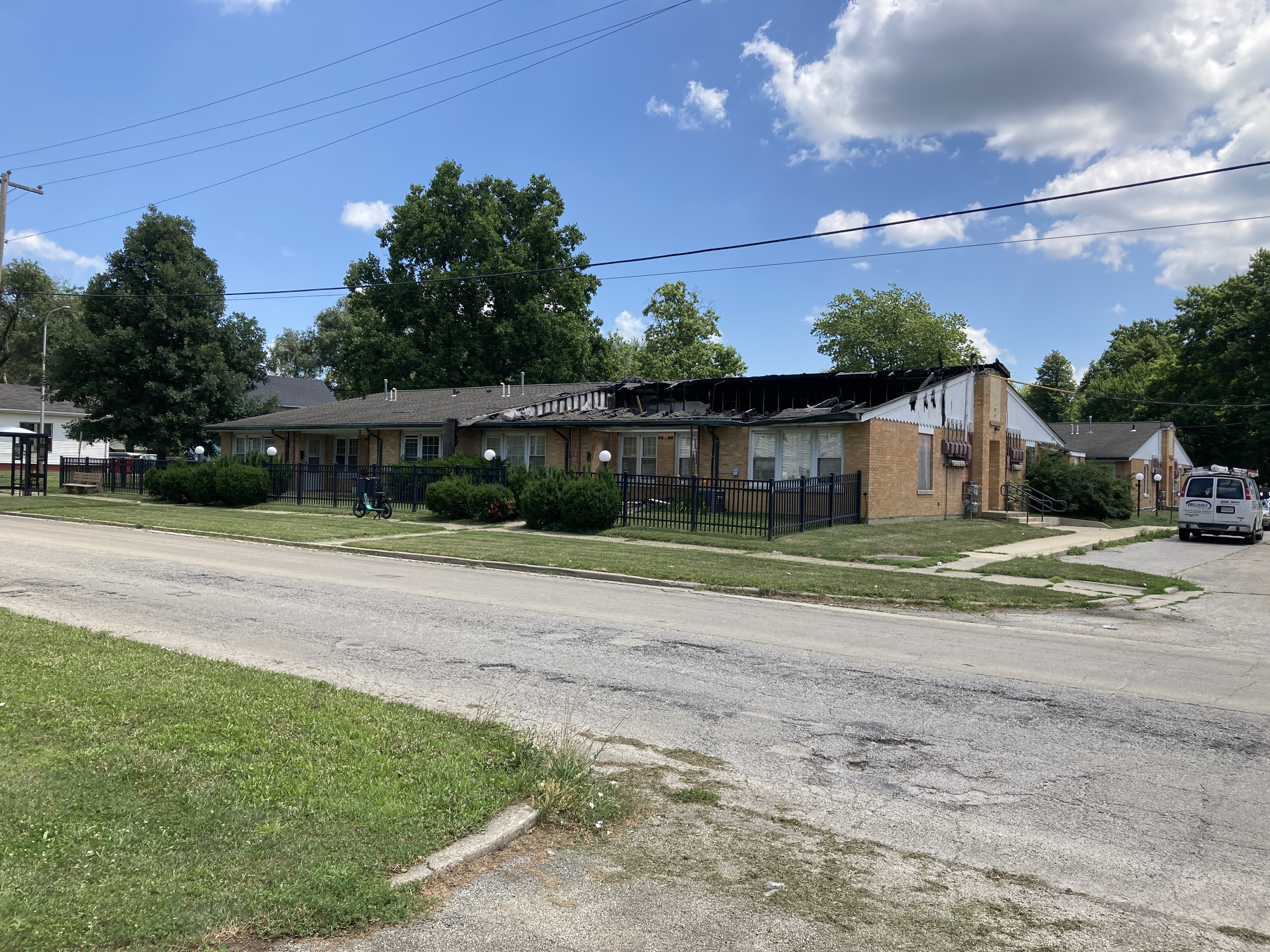 Photo of burnt out western building on the property.