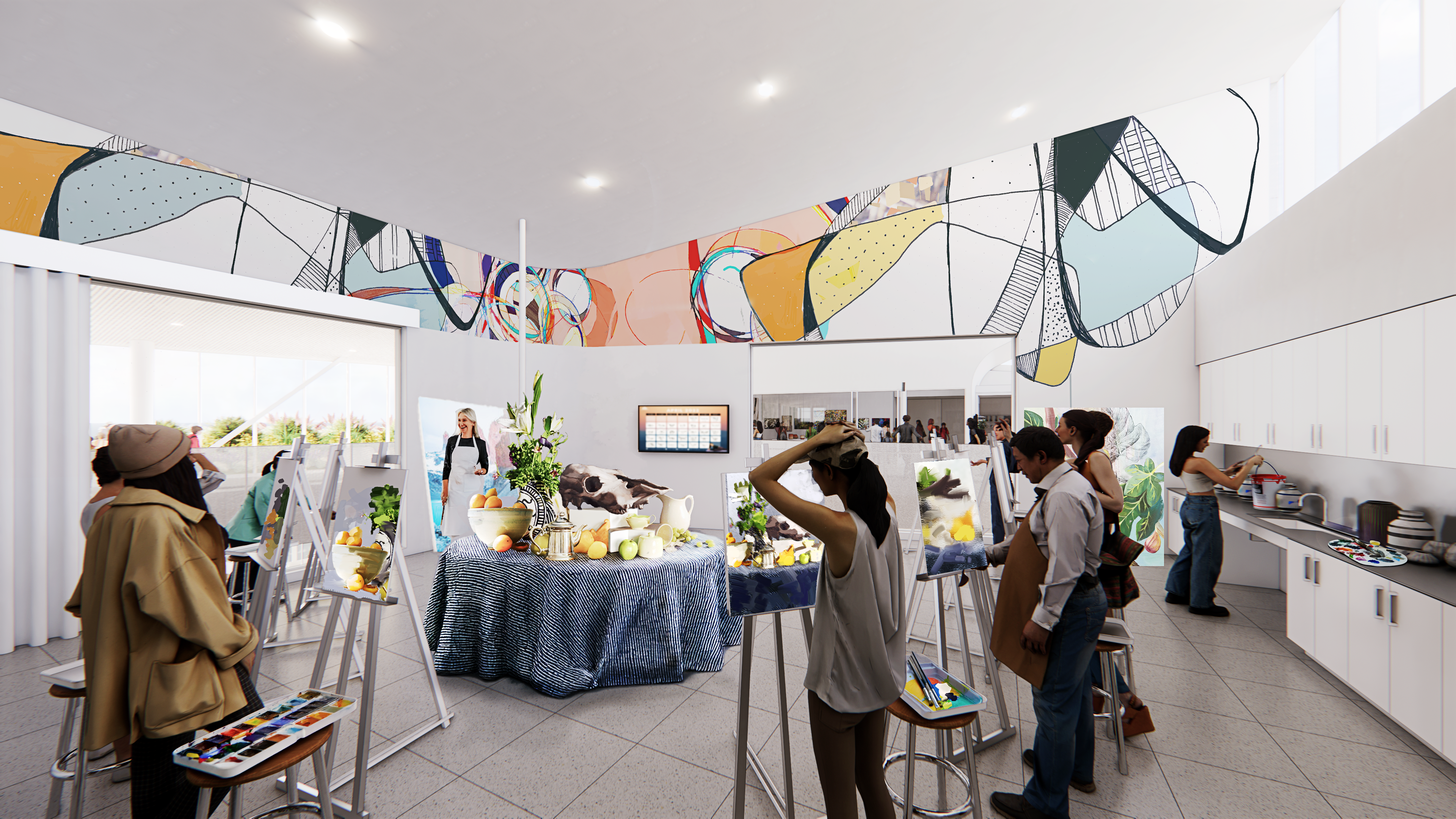 Classroom space with artists painting a still life. 