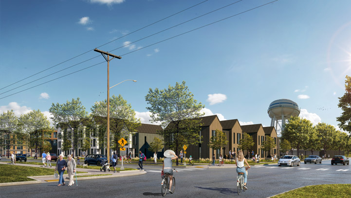 Rendering of potential future development on the northern portion of the Fire Station parcel at the intersection of Devine and Idaho, including two story homes fronting Idaho and Devine and then stepping up to three stories closer to Mill Plain. Improvements to the west side of Devine show a new sidewalk and bikeway, as well as a wider planting strip and new street trees. The eastern portion of the intersection remains as it currently exists without sidewalks. The image shows people walking, biking, and pushing strollers, and cars driving on the roadway. The existing water tower is visible behind the two story homes fronting Idaho.