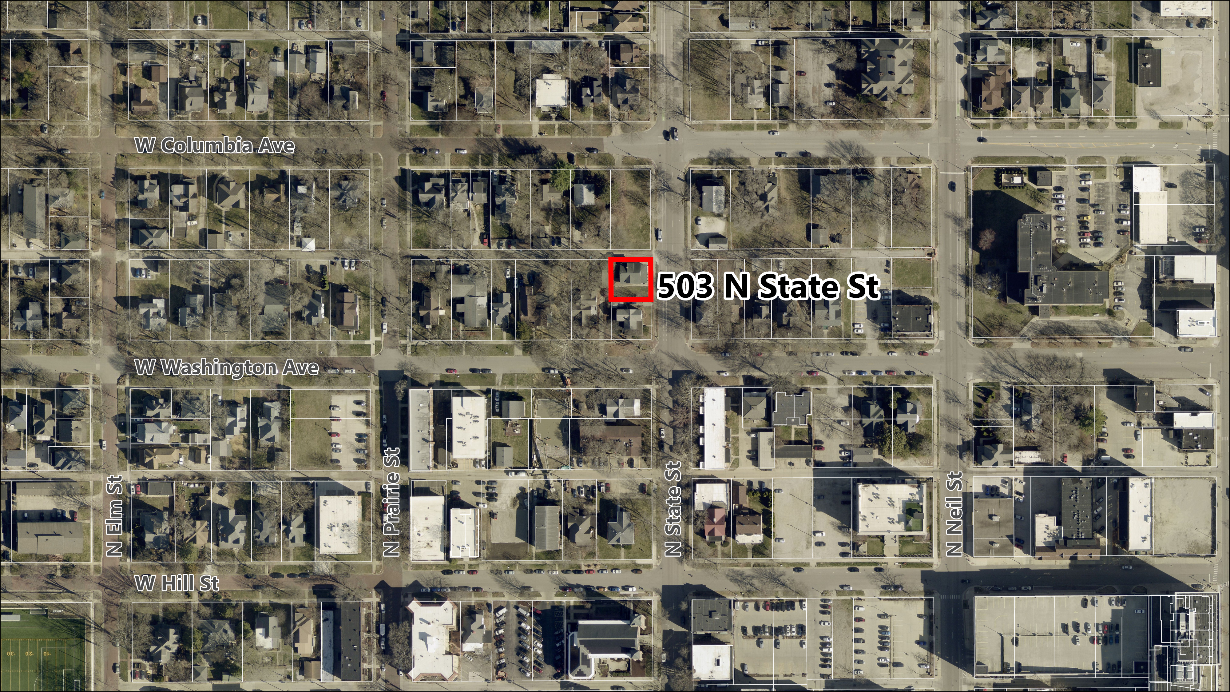 Satellite imagery showing the subject property highlighted in red sitting on the west side of North State Street between West Columbia Avenue and West Washington Avenue, northwest of Downtown Champaign.