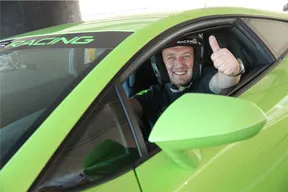 Happy Customer driving a Lamborghini