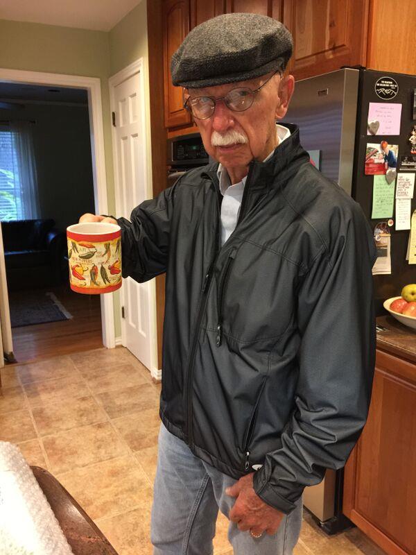 His favorite coffee cup with different hot peppers on it.