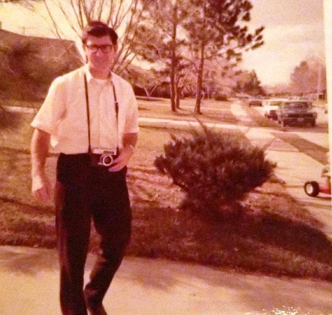 Gene loved photography. Outside with Doug on Big Wheel, 1971